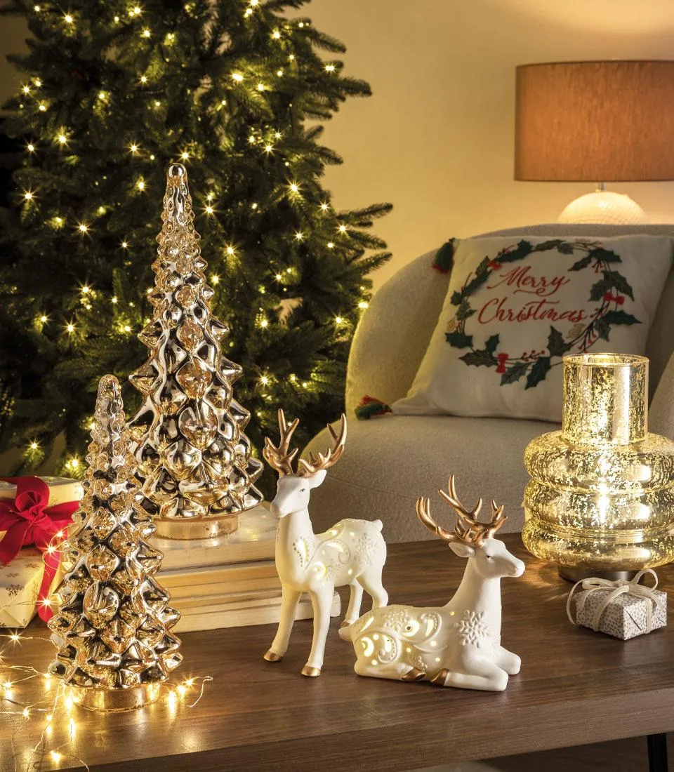 Renna seduta decorativa